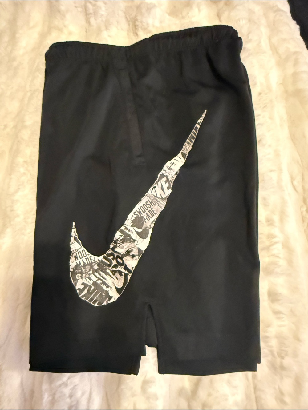 Nike Black Athletic Shorts with White Graphic Swoosh